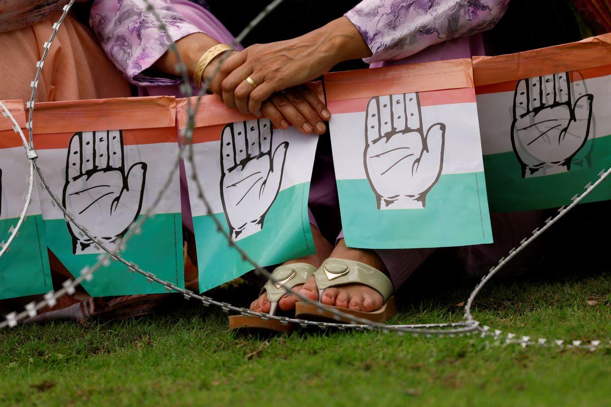 A Kashmiri woman listens to Rahul Gandhi, a senior leader of India's main opposition Congress party, during an election campaign rally ahead of the first phase of the assembly election, in Doru village in south Kashmir's Anantnag district, September 4, 2024. REUTERS/Sharafat Ali